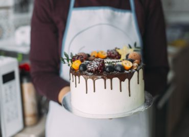 crop-person-holding-cake