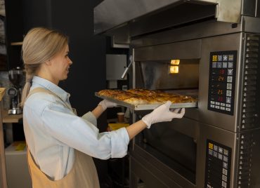 medium-shot-woman-working-bakery (2)